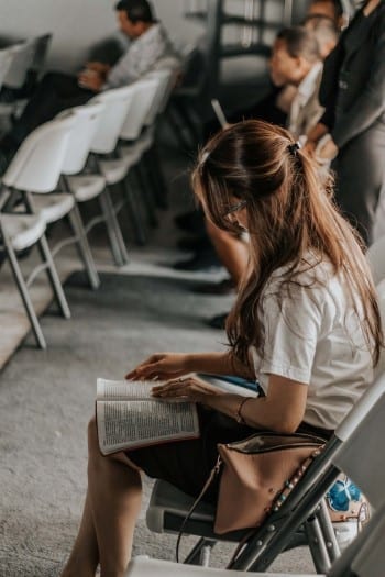 Lady reading Bible at study